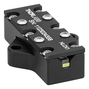 NLCK1 - Mounted PPKTP Crystal, 30 mm Length, 3.400 µm Poling Period, 405/810 nm Type-0 SPDC