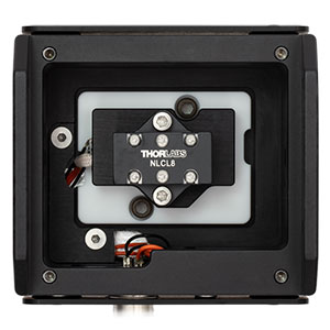 An NLCL8 noncritcal phase matching crystal is shown mounted in an NLCH2 nonlinear crystal oven for temperature control.